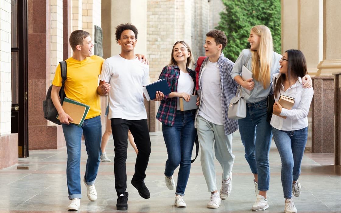 Students walking through a university corridor in Buffalo, NY