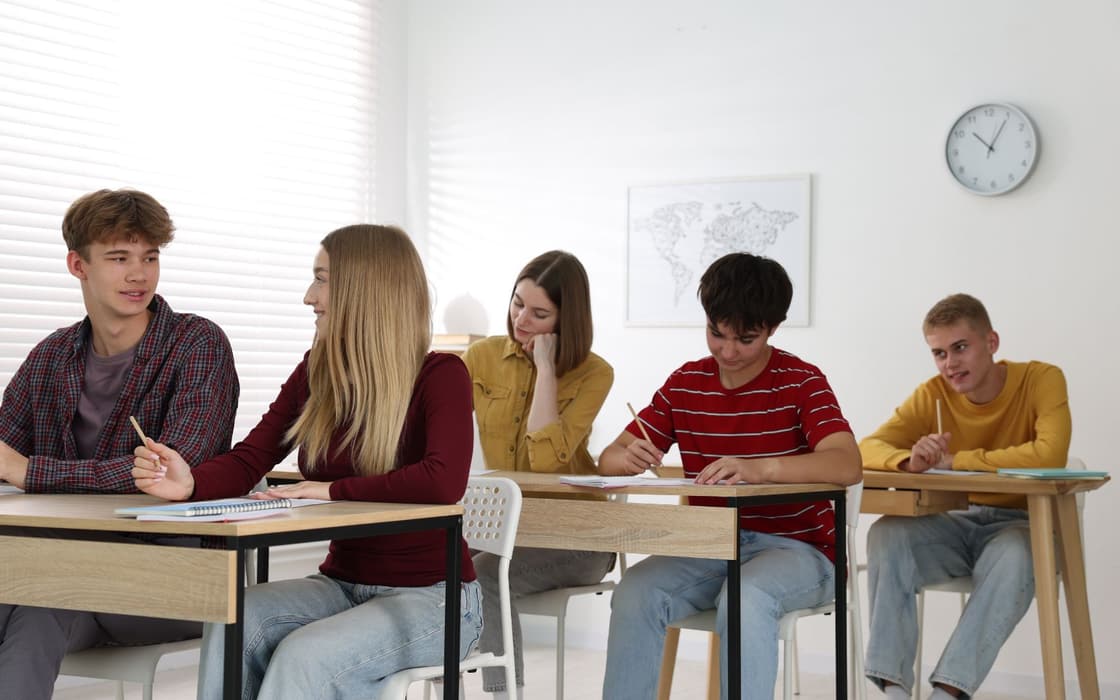 Classroom of students writing at their desks in Fredonia, NY